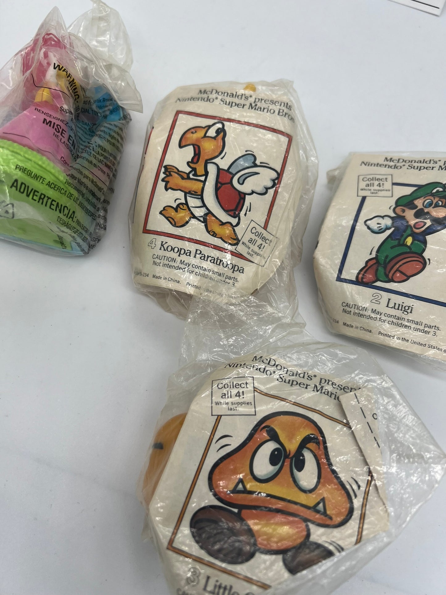 3 1989 McDonald’s Nintendo Super Mario Bros. 3 Happy Meal Toy plus 1 newer toy